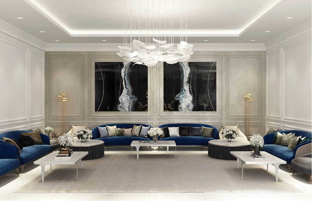 Mẫu thiết kế phòng khách biệt thự hiện đại này gây ấn tượng với người nhìn bởi sự kết hợp tinh tế giữa ba màu xanh - xám - đen, hệ thống đèn chùm trang trí và bức tranh treo tường